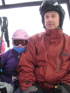 Ski racing dad and his young ski racer.