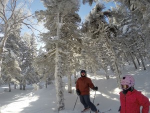 Ski racing dad and his daughter enjoying a non-race day skiing together.  The skills she has learned from ski racing have enabled her to ski in the woods with dad comfortably.