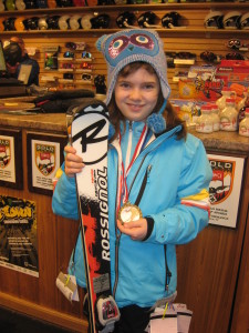 Plan ahead to buy new junior race skis for your child when they need them.
