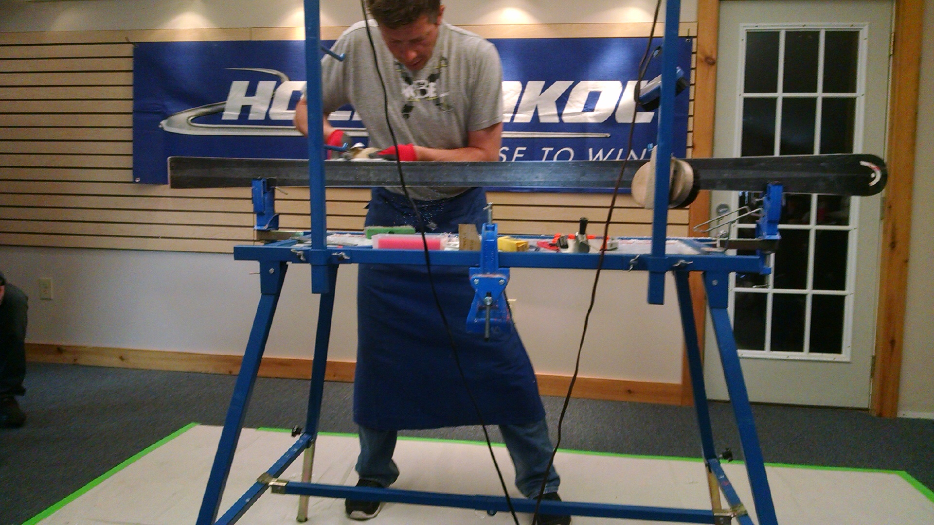 Alex Martin hand tuning skis at the Head Skis clinic April 2015.